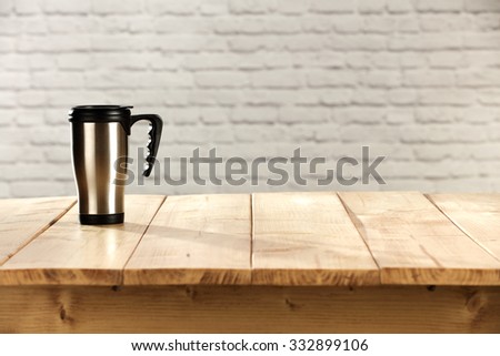 silver mug and table 