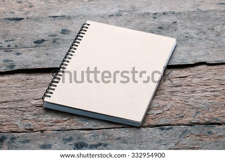 notebook with space on old wooden.