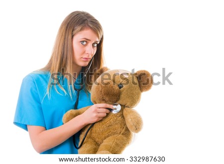 Sad pediatrician regretting the sickness of the toy bear.