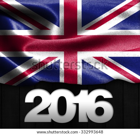United Kingdom Flag & Happy New Year 2016 typography on wood texture background