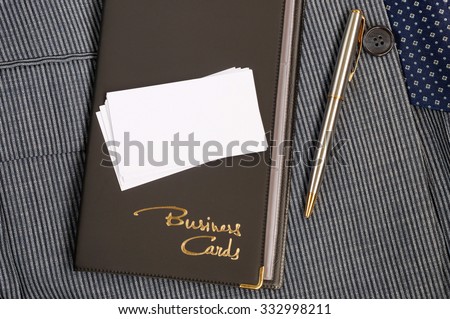Case for business cards from a leather substitute and blank business cards Royalty-Free Stock Photo #332998211