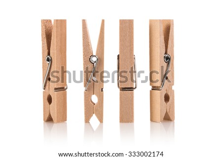 Wood clothespins isolated on white background Royalty-Free Stock Photo #333002174