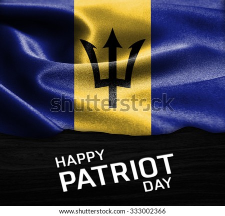 Happy Patriot Day Barbados flag on wood Texture background
