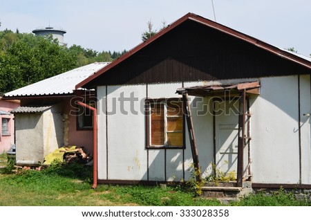 old ugly house before reconstruction Royalty-Free Stock Photo #333028358