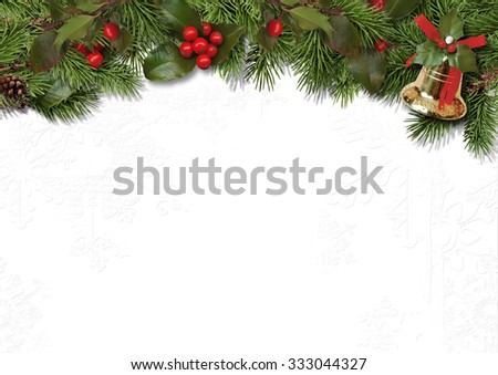 Christmas border branches and holly on white background