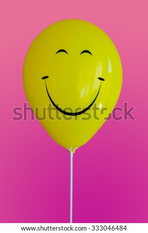 Happiness. Yellow balloon