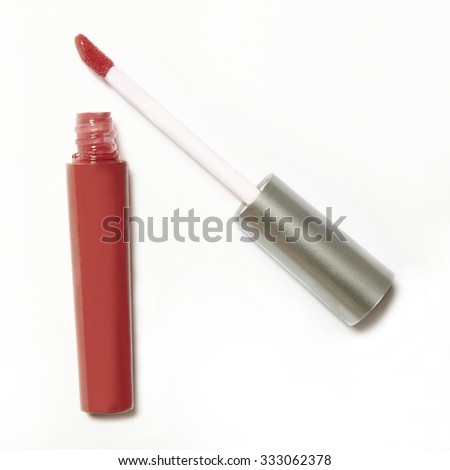 pink red lip gloss package on white background