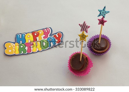 Cupcakes on grey background - happy birthday card
