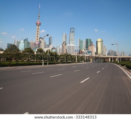 Empty road with Shanghai Bund Lujiazui modern city buildings backgrounds 
