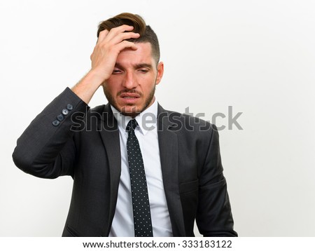 Portrait of depressed businessman