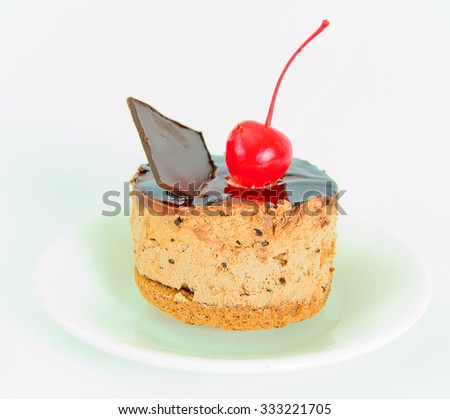 Cupcake with Cherries and Chocolate. Studio Photo.