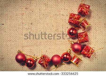 Christmas vintage decoration on the striped sack background