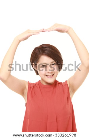 Japanese woman showing OK gesture