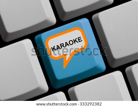 Red Computer Keyboard with speech bubble showing Karaoke