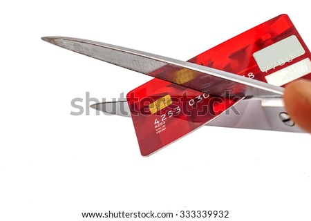 photo of scissors cutting old credit card on white background, SOFT FOCUS