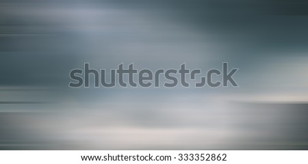 Gray blurred motion background for design and other
