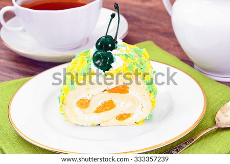 Sponge Roulade with Cream, Mandarin and Cherry Studio Photo