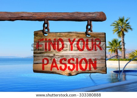 Find your passion motivational phrase sign on old wood with blurred background