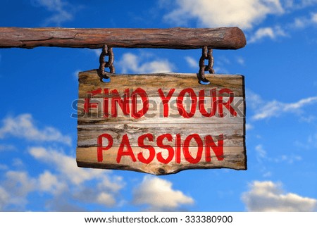 Find your passion motivational phrase sign on old wood with blurred background