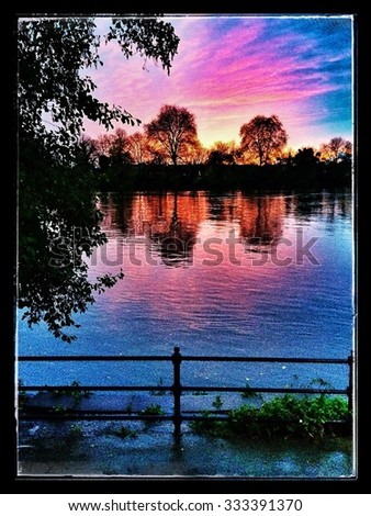the thames at high tide in chiswick west london