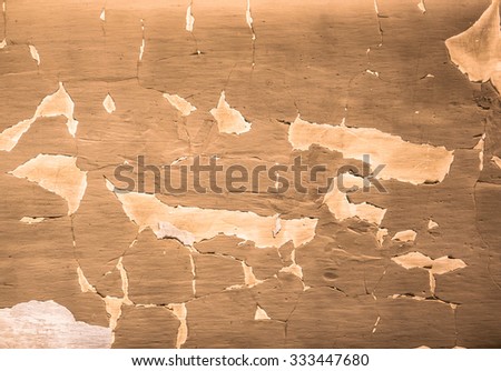 worn wall paint that is torn