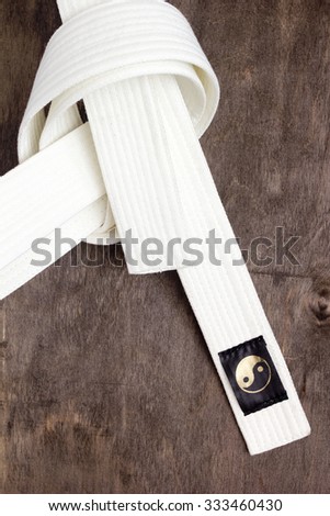 White belt karate - Belt first level training. Royalty-Free Stock Photo #333460430