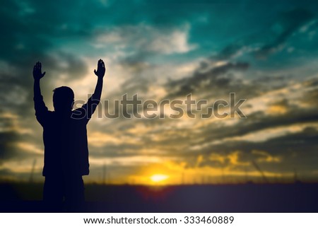 Silhouette man with hands rise up on beautiful view. Christian praise on hill thanksgiving day background. Now one man standing on peak open arms enjoying nature the sun concept world wisdom fun hope