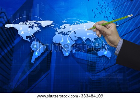 Businessman hand holding a pencil pointing at global business connection map, Elements of this image furnished by NASA