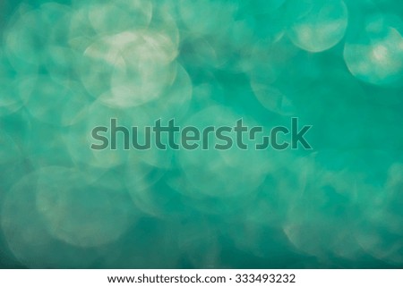 abstract green bokeh background. blurred lights