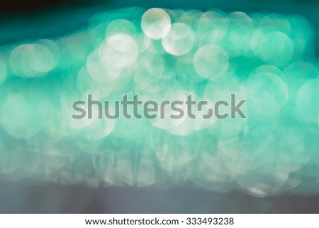 abstract green bokeh background. blurred lights
