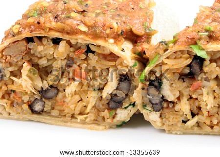 delicious mexican famous burrito with hot sauce