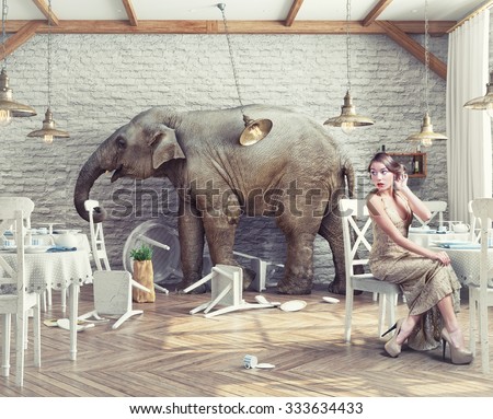 the elephant calm in a restaurant interior. Photo combination concept