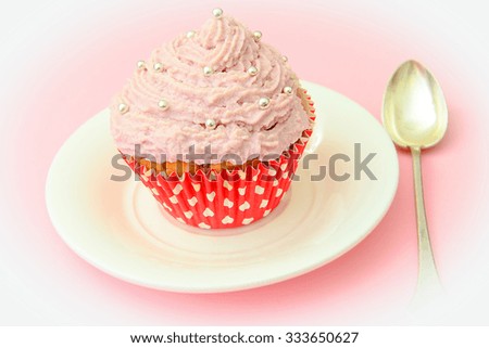 Cake with Cream, Cupcake on Pink Background. Studio Photo