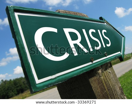 CRISIS road sign