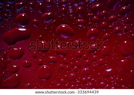 A studio photo of water droplets up close