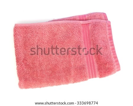 A studio photo of a pink bath towel