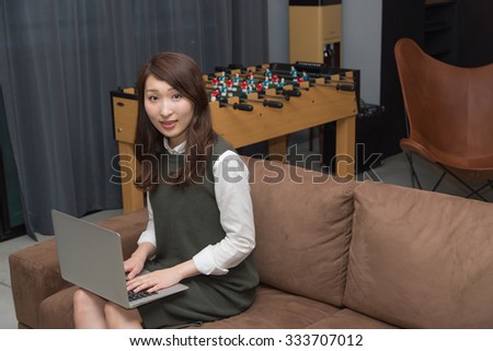 asian woman using laptop 