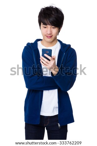 Asian man use of the cellphone