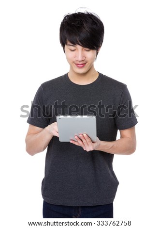 Asian man use of tablet pc