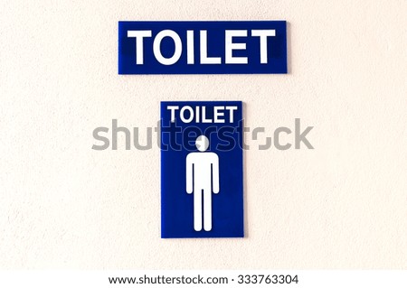 Blue man toilet sign