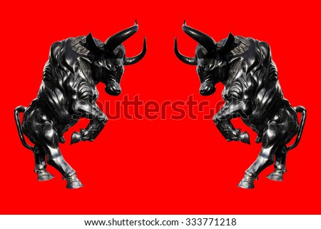 Bull statue on red background