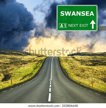 SWANSEA road sign against clear blue sky