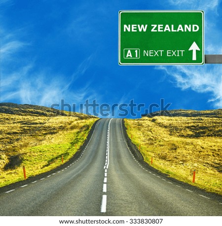 NEW ZEALAND road sign against clear blue sky