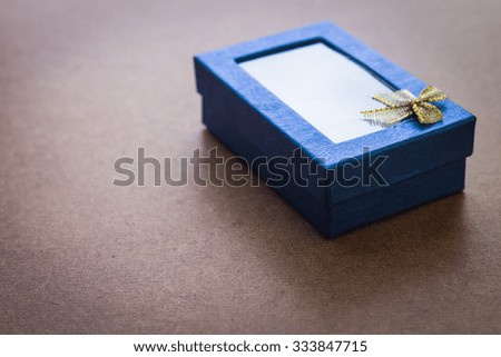gift box on old wooden background.