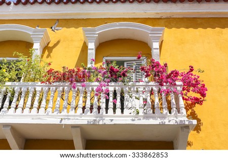 Cartagena - the colonial city in Colombia is a beautifllly set city, packed with historical monuments and architectural treasures. The picture present facade of the colonial house with balconies