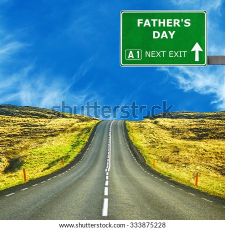 FATHERS DAY road sign against clear blue sky