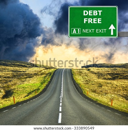 DEBT FREE road sign against clear blue sky