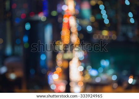Blurred bokeh lights city road during busy hour