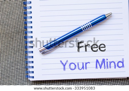 Free your mind text concept write on notebook