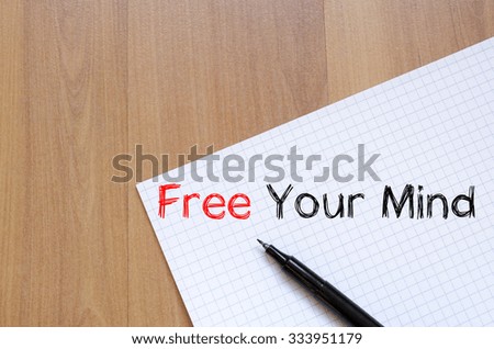 Free your mind text concept write on notebook